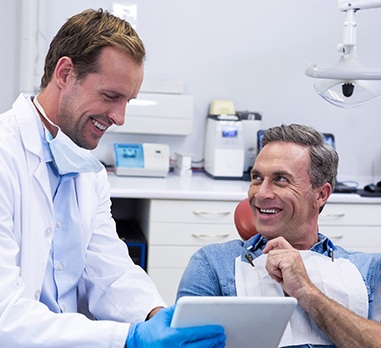 Man smiling at dental office