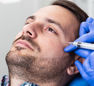 Man receiving Botox injection