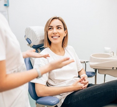 woman smiling at her dentist