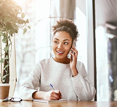 Woman calling dental office