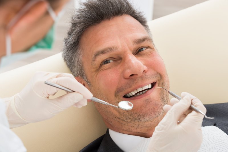 Man smiling in dental chair