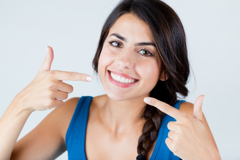 patient smiling after teeth whitening in Daniel Island 